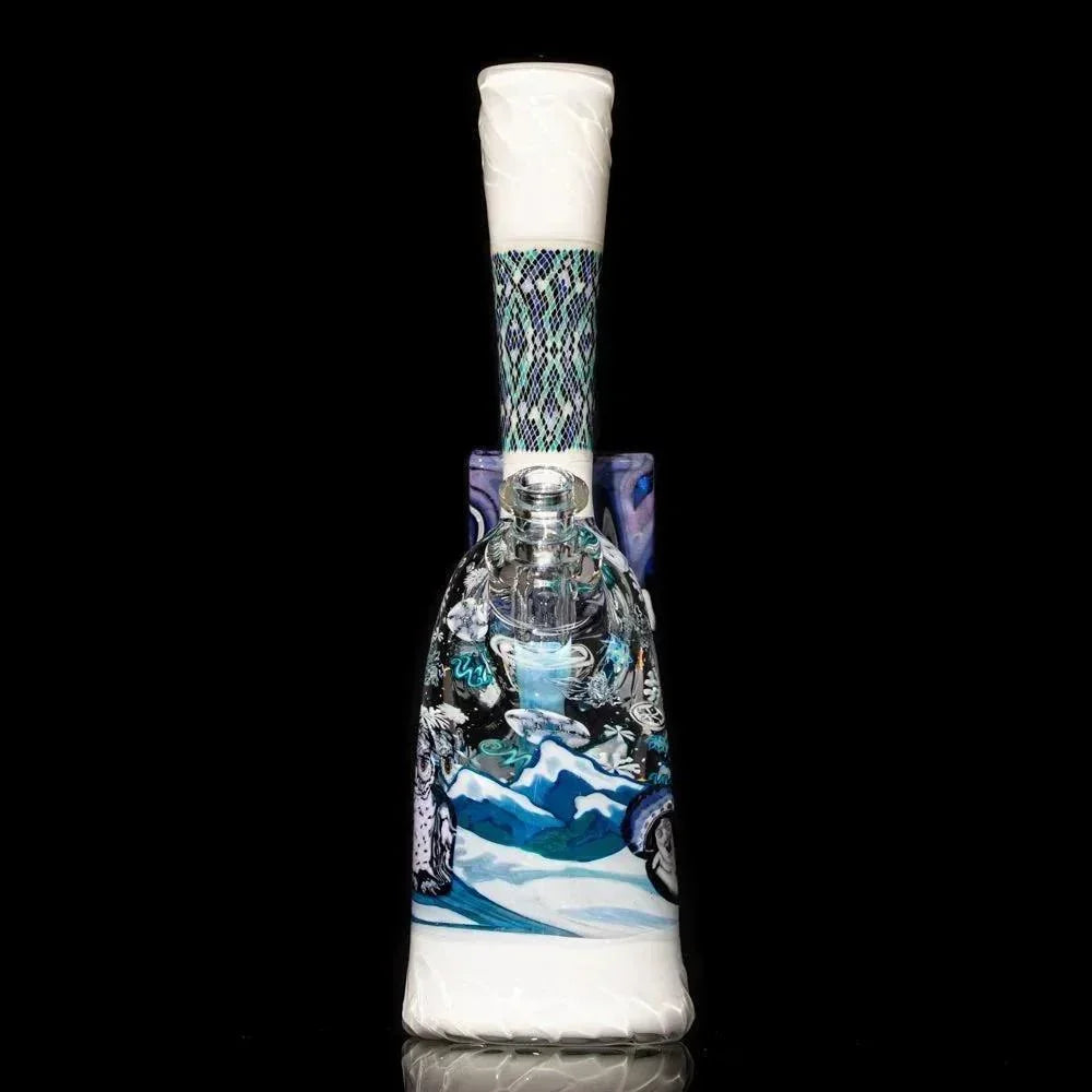 Hand-blown glass water pipe with blue mountain and wave designs, intricate patterns on neck