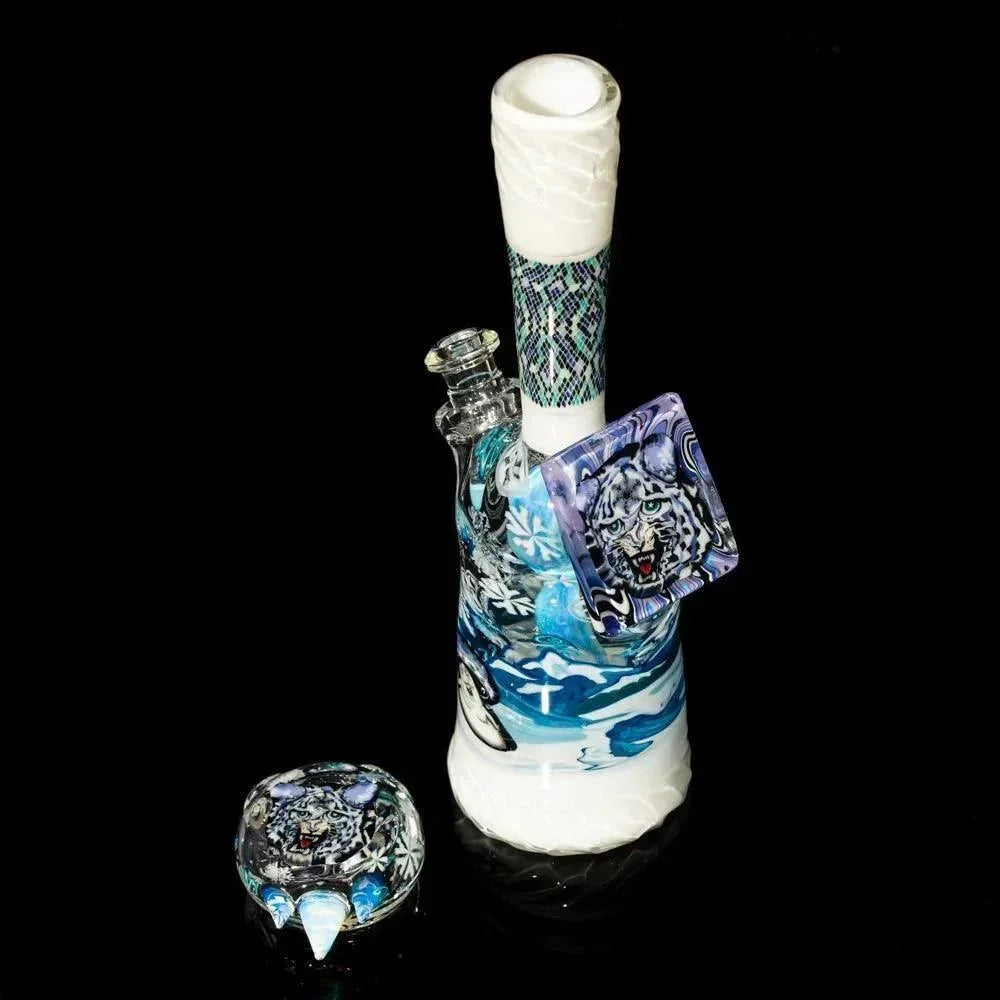 Heady glass water pipe with intricate blue designs, snowflakes, and tiger portrait artwork.