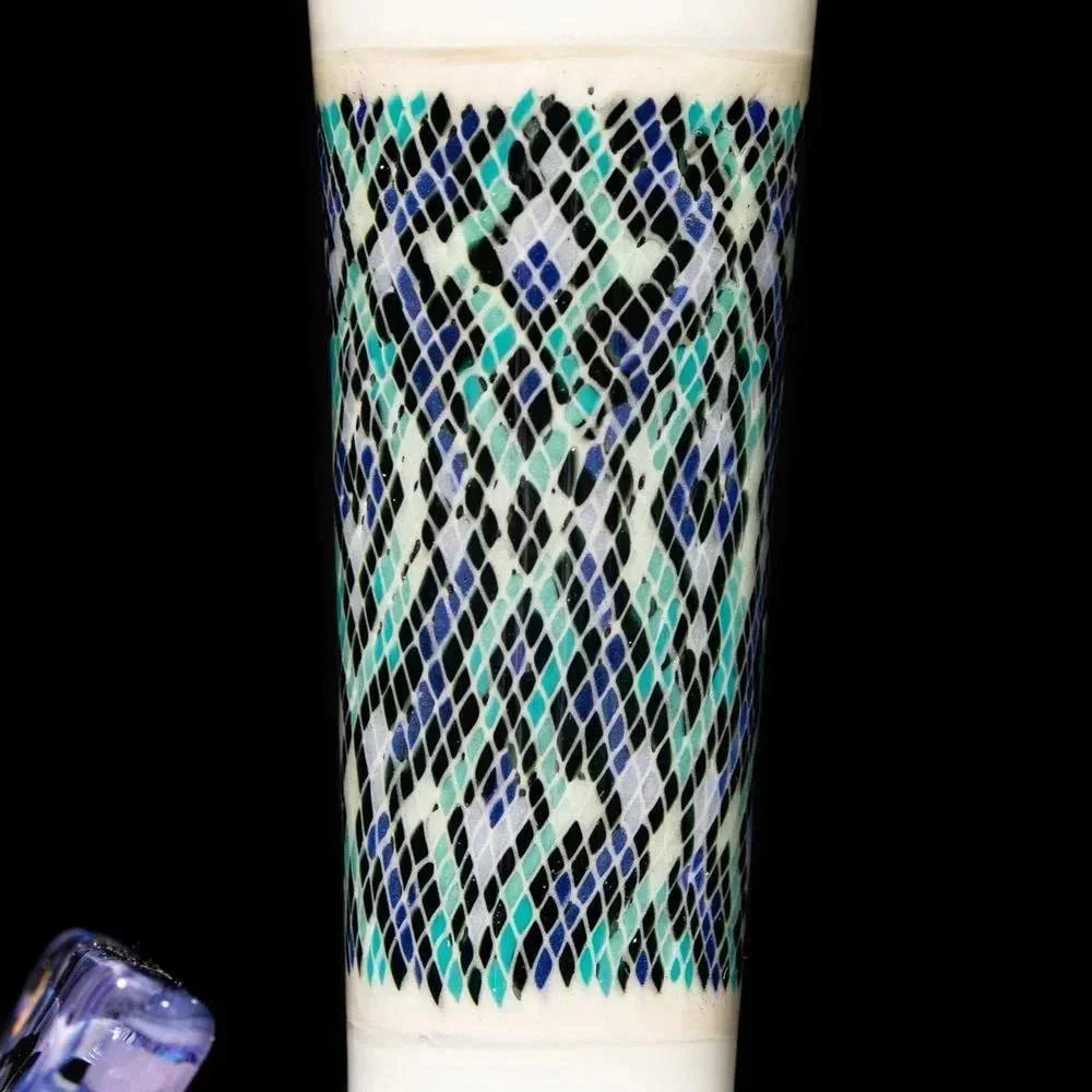 Intricate heady glass pipe with blue, black, and teal lattice pattern on white background.
