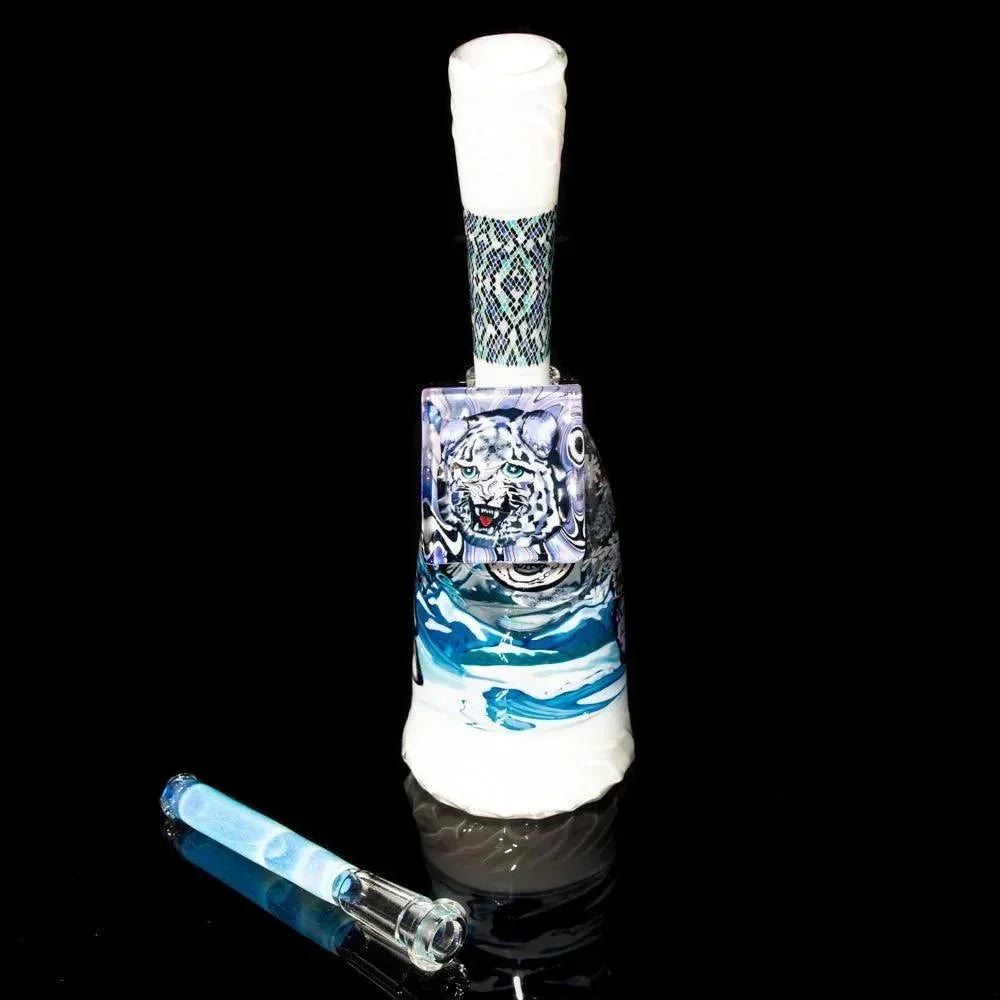 Heady glass water pipe with blue and white design and tiger face art, shown on black background