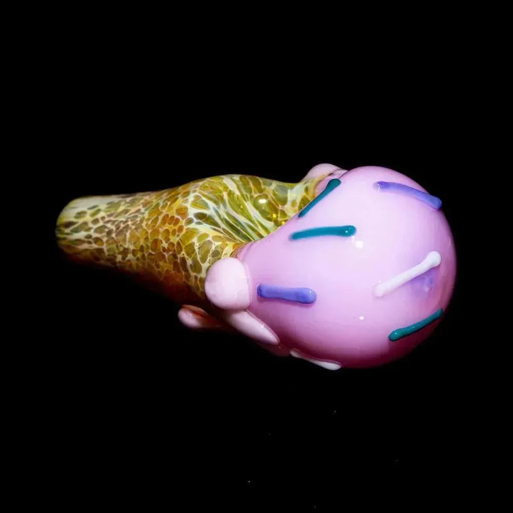 Hand-blown glass pipe shaped like an ice cream cone with pink and sprinkled scoop design.