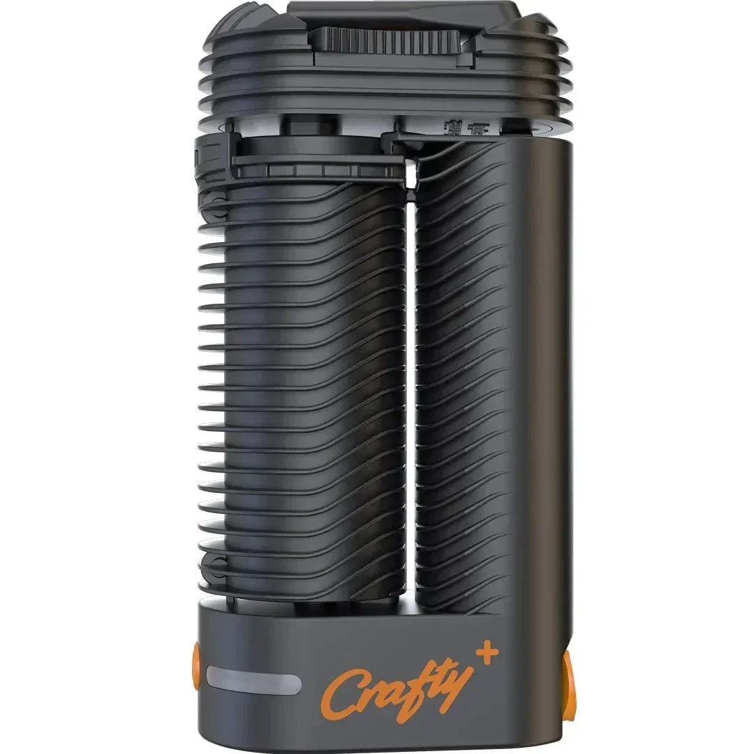 Crafty Plus portable vaporizer with ribbed black design and orange logo for dry herb use