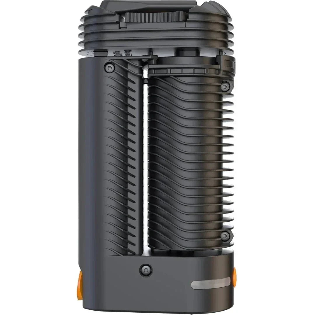 Portable dry herb vaporizer with black ribbed casing and orange accents, side view