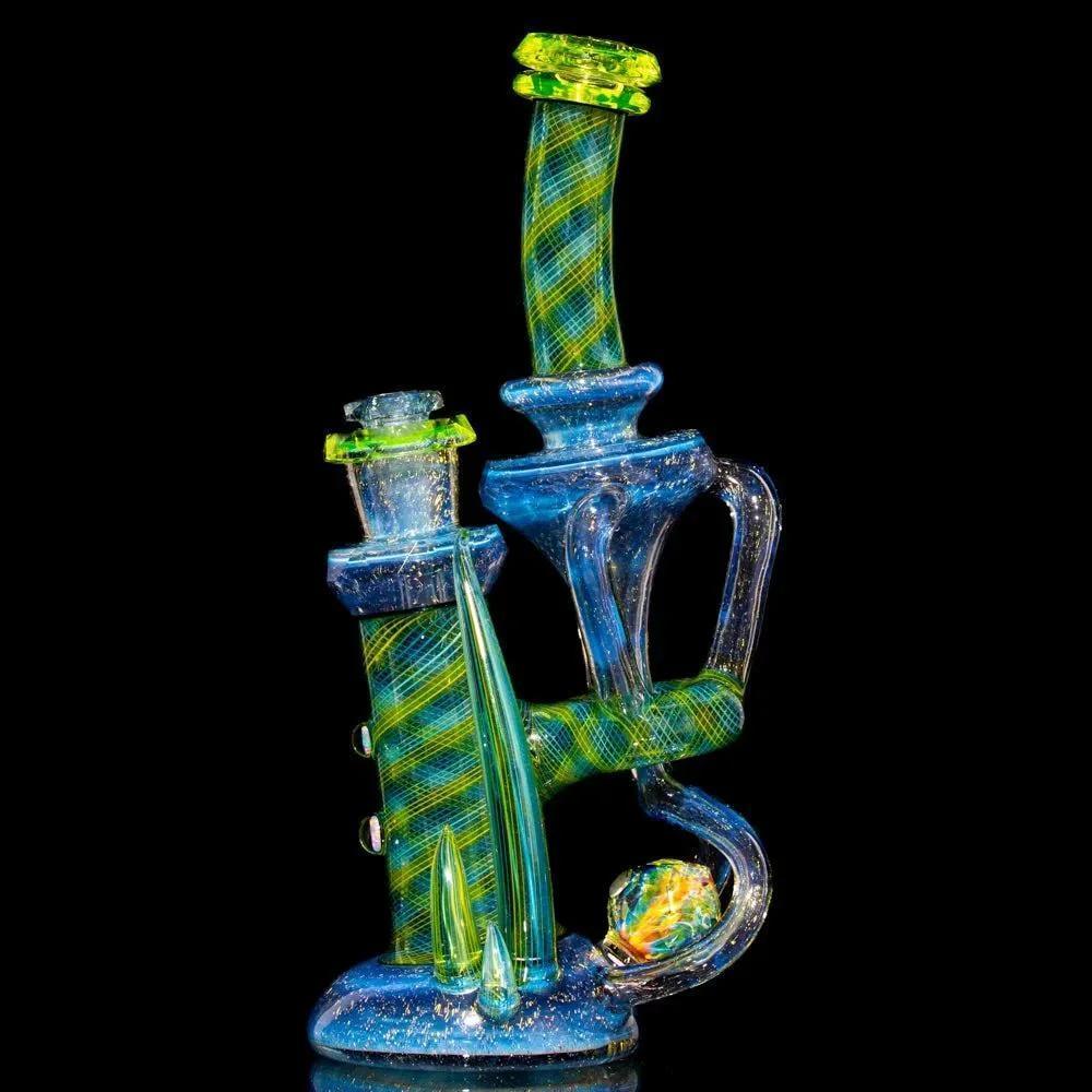 Colorful glass water pipe with blue, green, and yellow patterns, artistic heady glass design