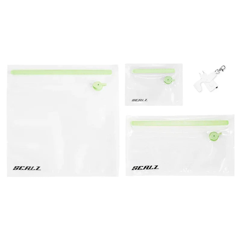 Set of three clear vacuum seal bags with green zippers and valve, plus bag sealer key