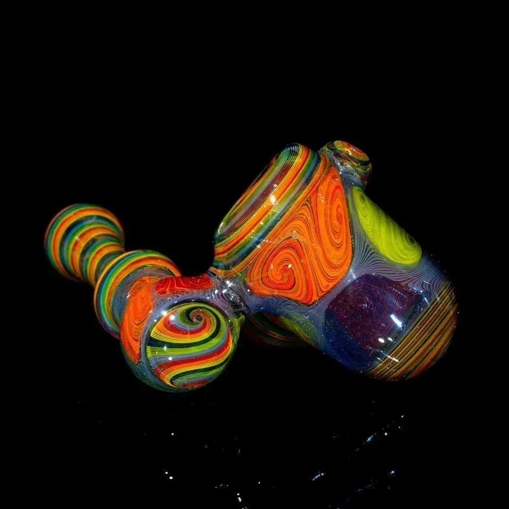 Colorful hand-blown glass sidecar pipe with vibrant rainbow swirl patterns on black background