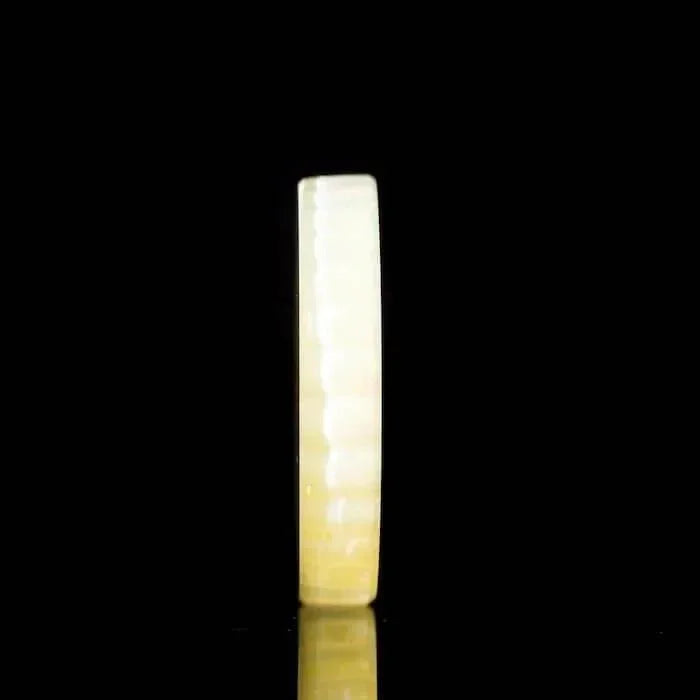 Ivory-colored textured glass pipe with smooth finish, ideal for heady glass collectors