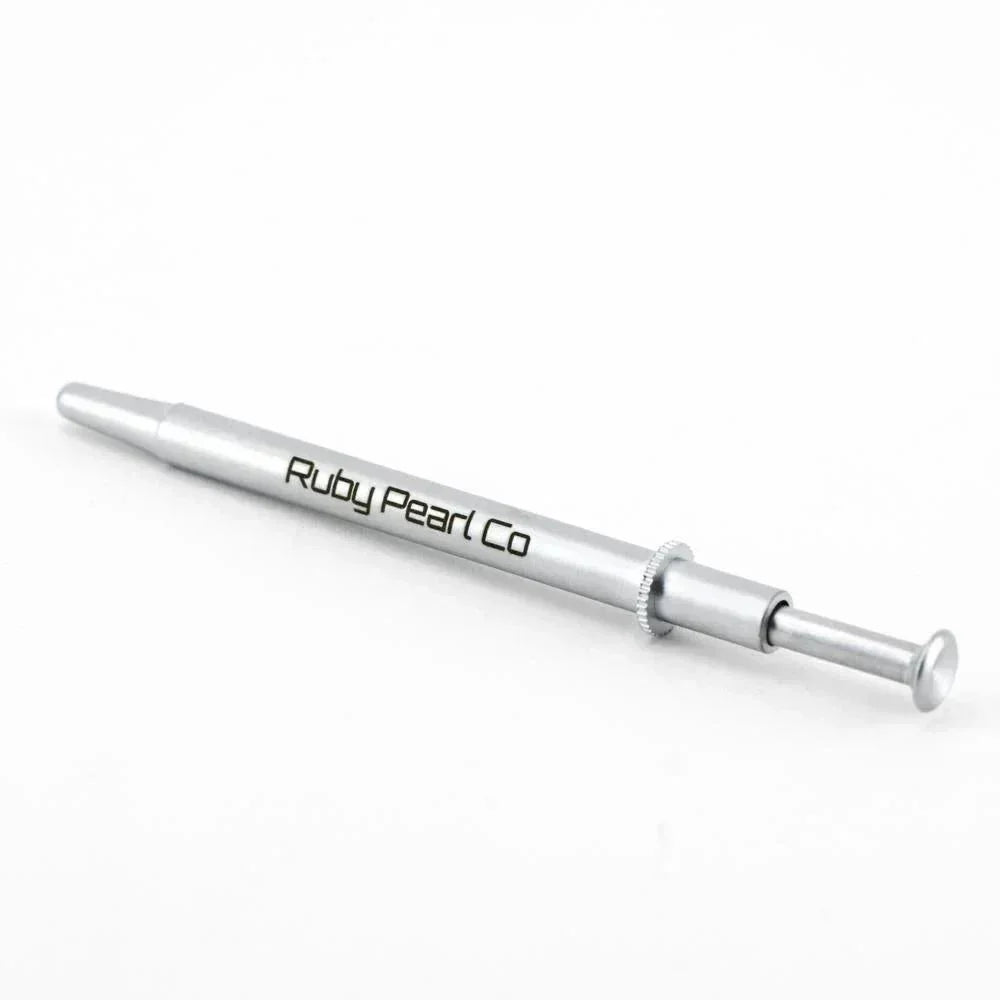 Metal dab pearl grabber tool with Ruby Pearl Co logo on white background