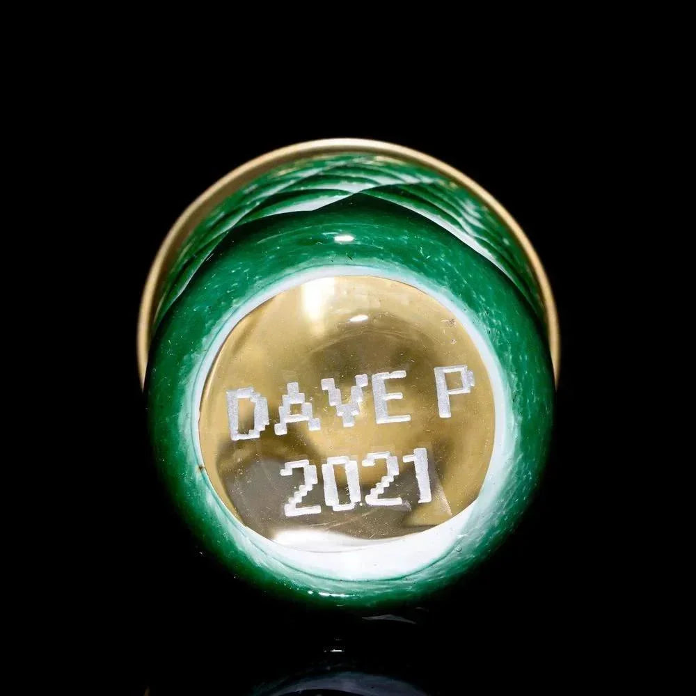 Green glass jar with gold base, engraved with 'DAVE P 2021' on the bottom