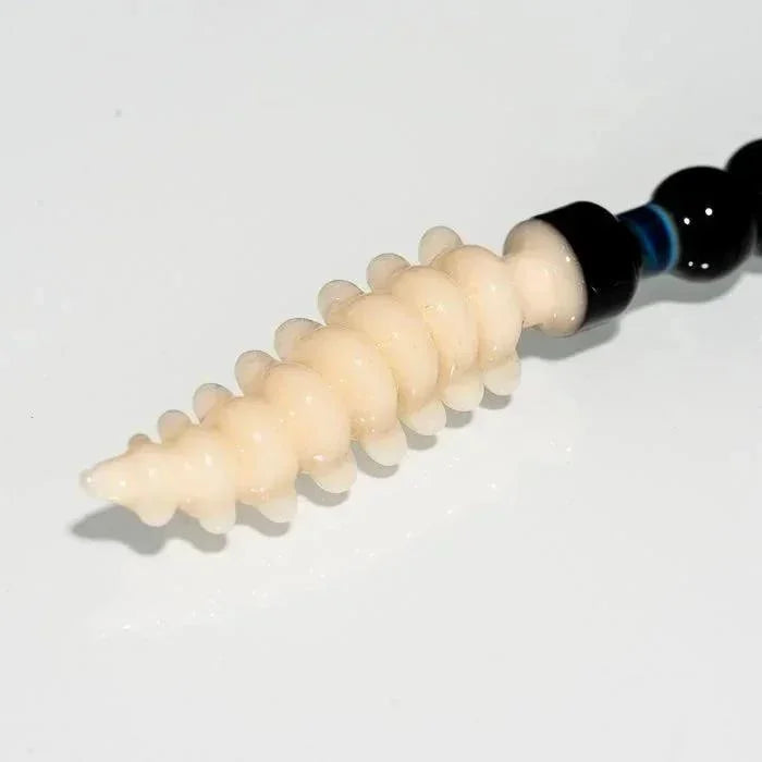 Cream spiral glass pipe with black accents, ideal for heady glass collectors