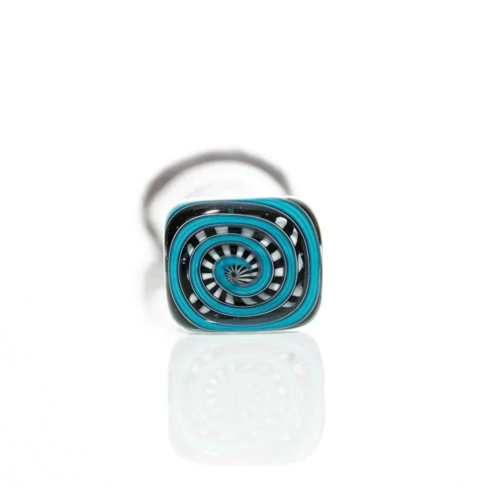 Square glass smoking accessory with spiral blue and black glasswork on white background