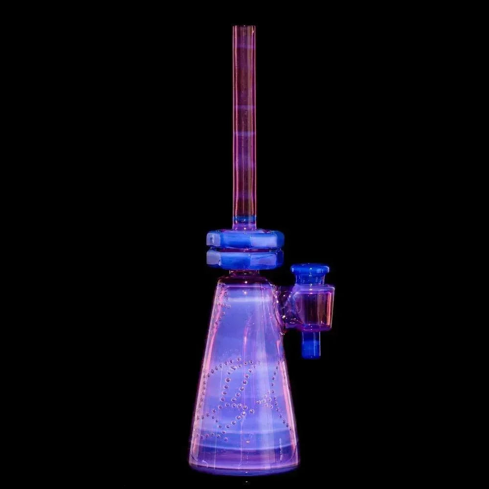 Colorful hand-blown glass water pipe with pink and blue accents on a black background.