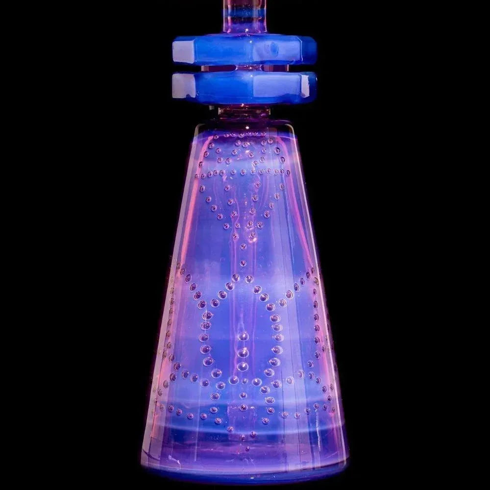 Colorful glass water pipe base with intricate bubble patterns and blue accents