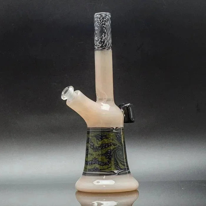 Hand-blown glass bong with swirled black and green accents, milky base, and decorative mouthpiece