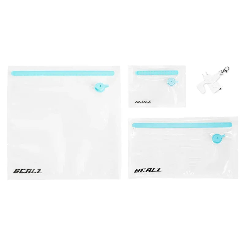 Set of Sealz clear vacuum storage bags with blue zip closures and pump tool