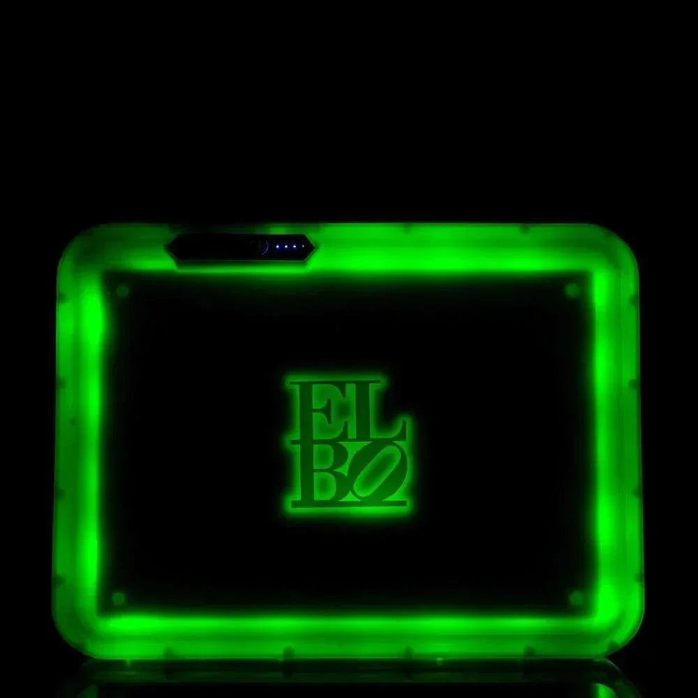 Glowing green ELBO vaporizer with illuminated branding and sleek design