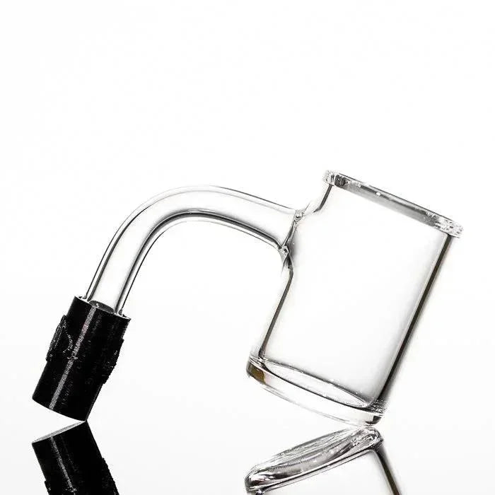 Clear glass dab rig with black carb cap, sleek design for vaporizers and heady glass collections