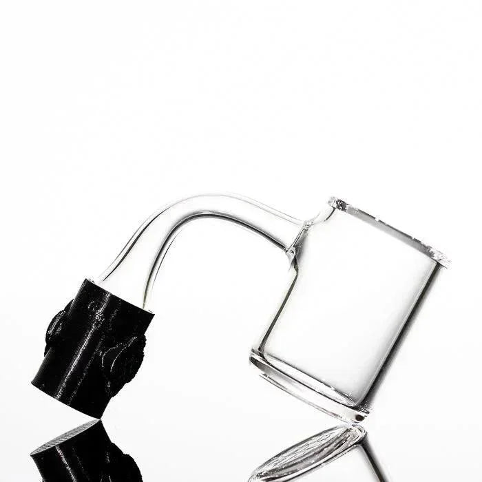 Clear glass bong with black 3D-printed mouthpiece, minimalist studio shot