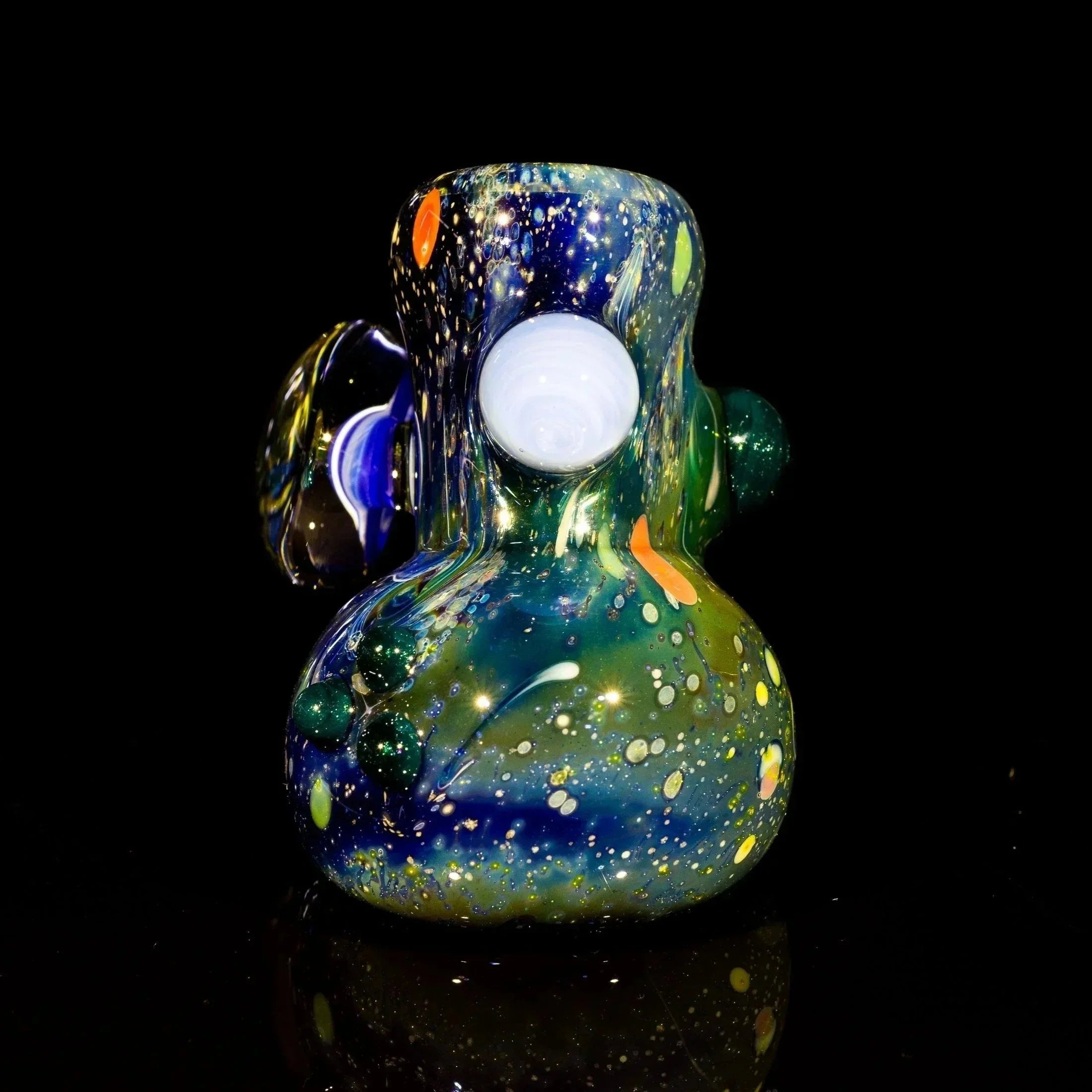 Colorful heady glass pipe with cosmic design, vibrant swirls, and speckled patterns for smoke shop enthusiasts.