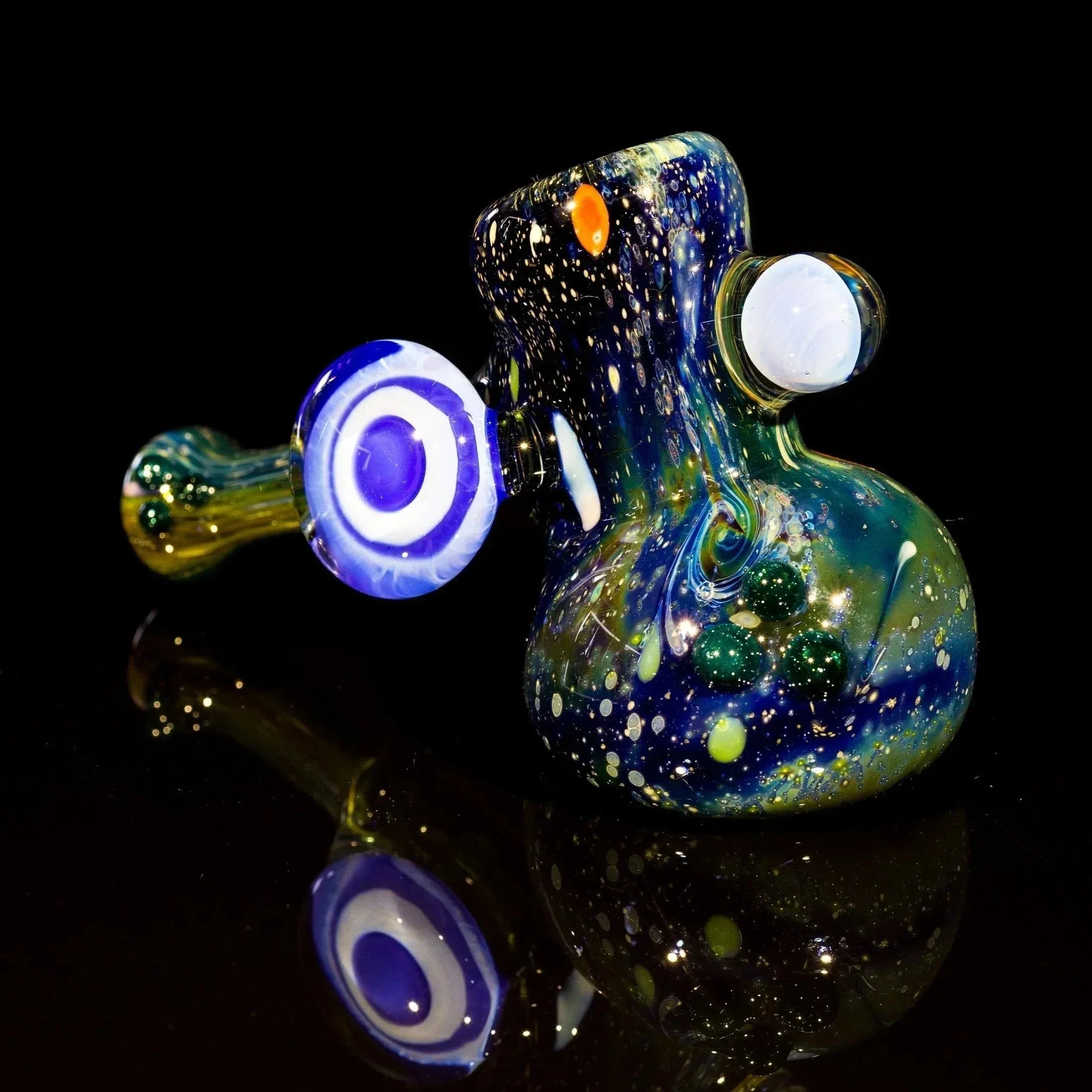 Colorful galaxy-themed glass pipe with swirls and embedded beads, ideal for heady glass collectors.