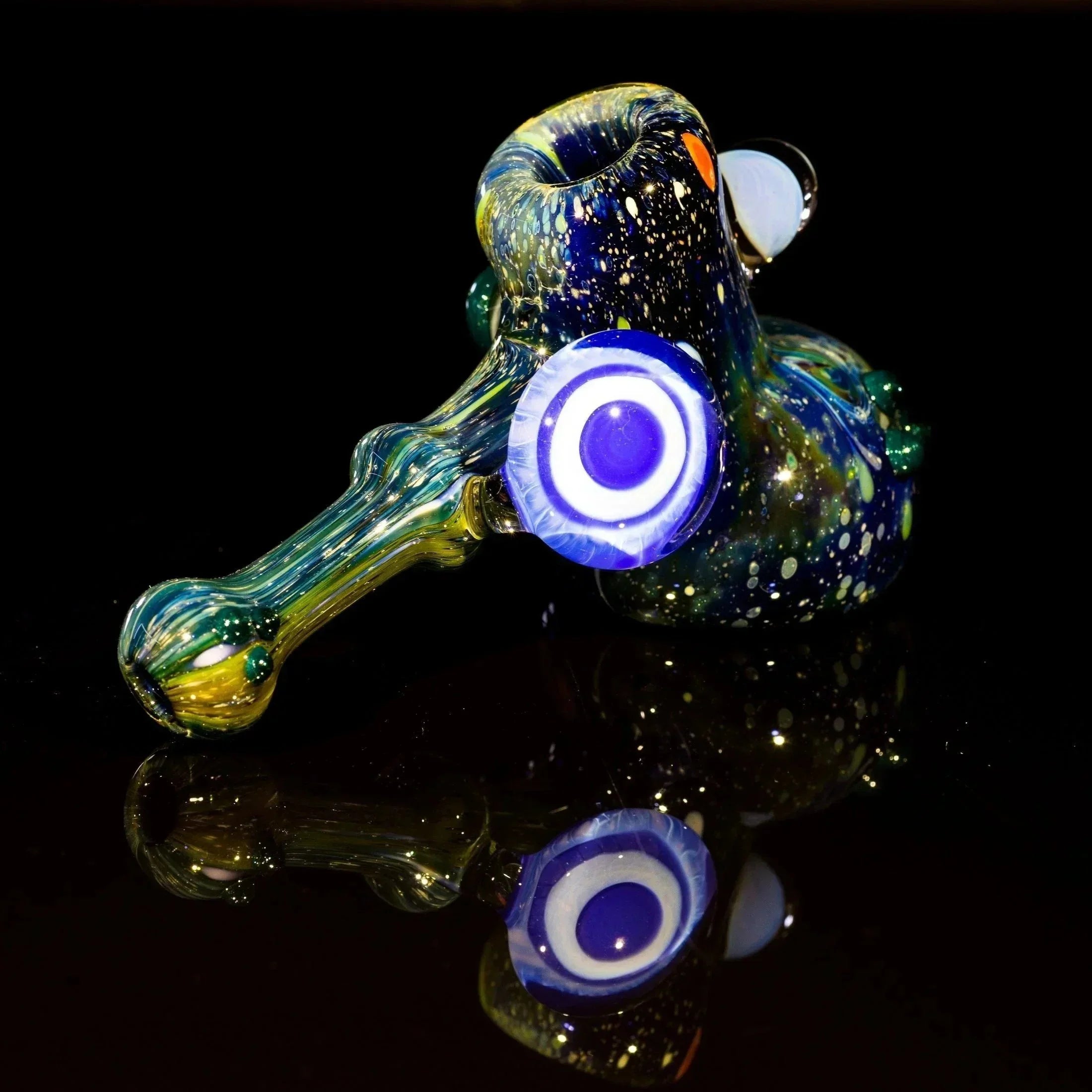 Colorful glass pipe with cosmic design and blue spiral accents
