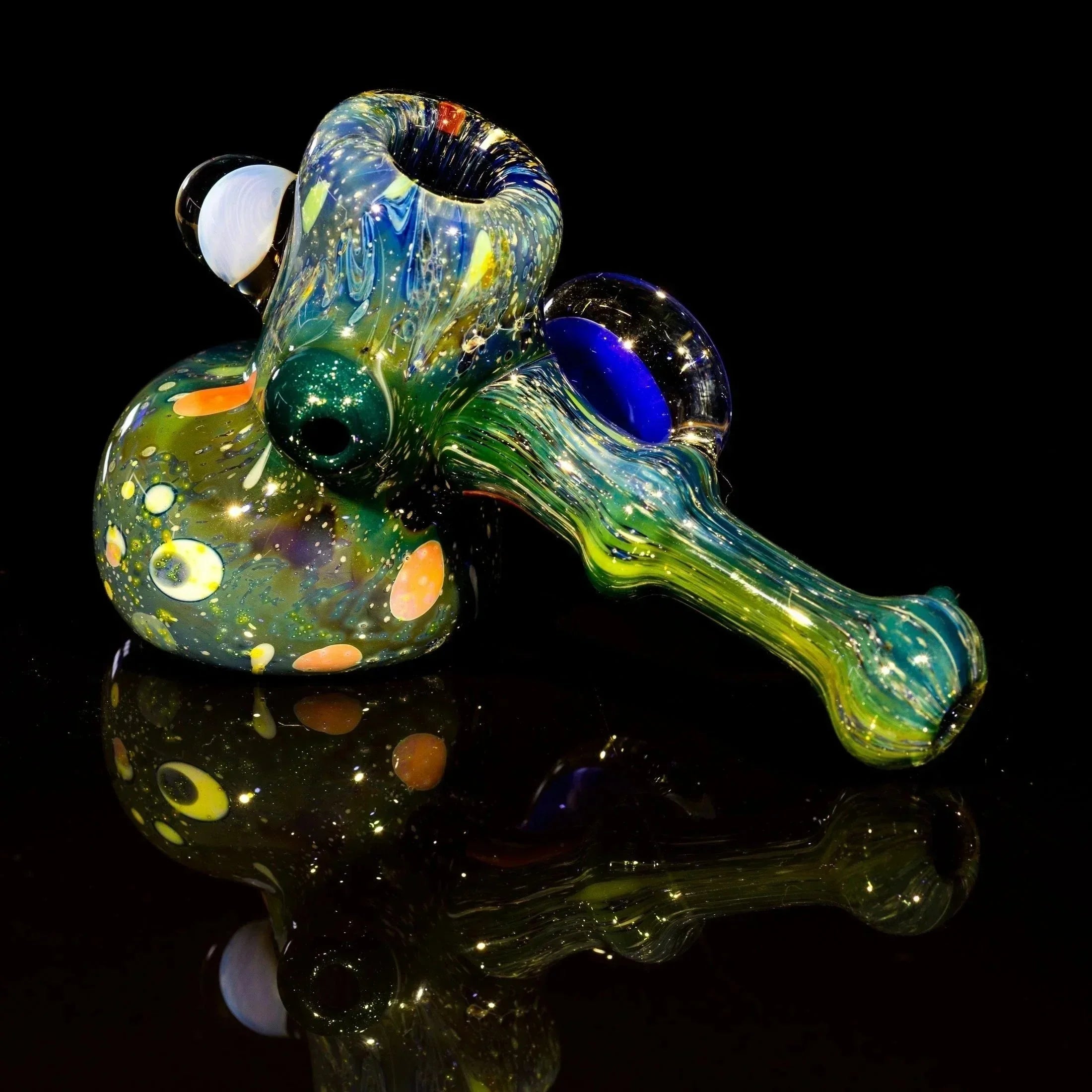 Colorful heady glass pipe with swirls and bubbles, vibrant green blue design