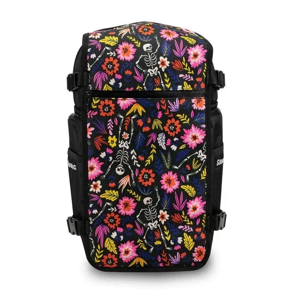 Colorful backpack with Day of the Dead skeleton and floral pattern on a black background