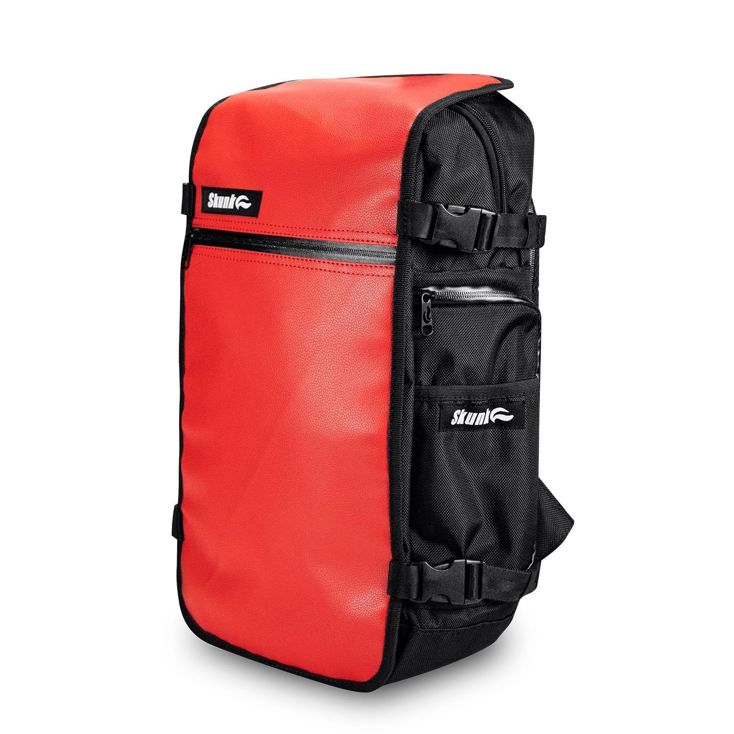 Red and black leather backpack with side zippers and adjustable straps, Skunk logo visible.