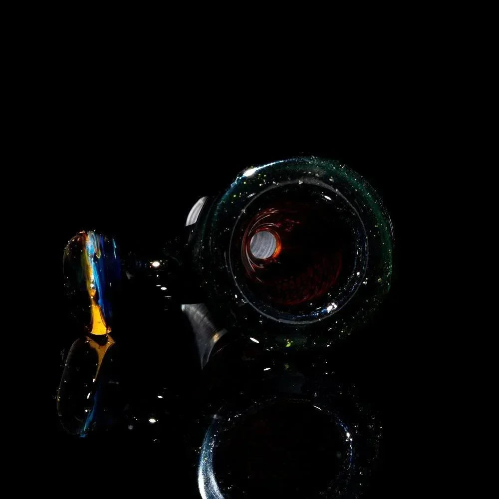 14mm glass snakeskin slide bowl with iridescent colors on a black background