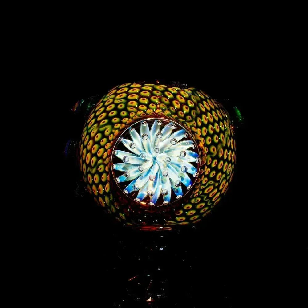 Colorful anemone-patterned glass spoon pipe with intricate swirl and dot design