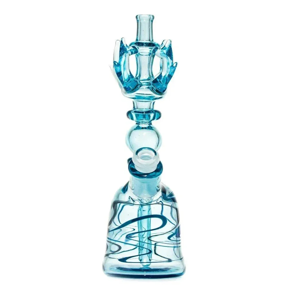 Blue glass water pipe with intricate design and decorative accents, isolated on white background