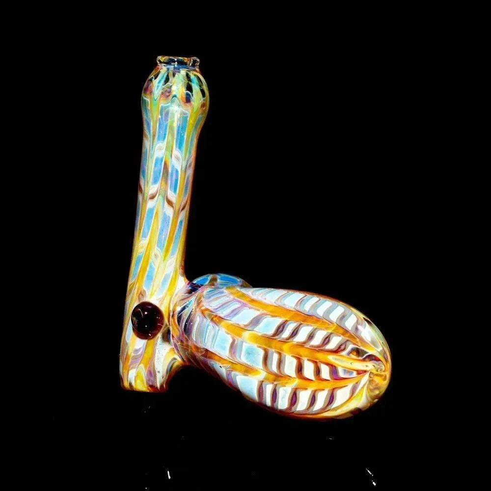 Amber and purple striped glass sidecar pipe with raked design on black background