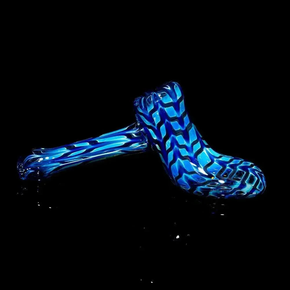 Blue patterned glass hammer pipe with vibrant wrap design on black background