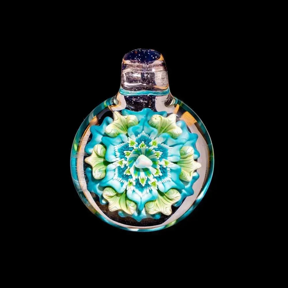 Hand-blown glass pendant featuring a vibrant blue-green opal flower design on black background.