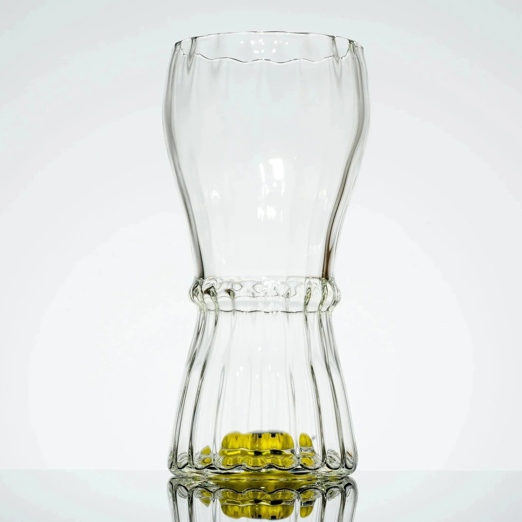 Clear glass bong with yellow accents, sleek design for vaporizers and heady glass collections