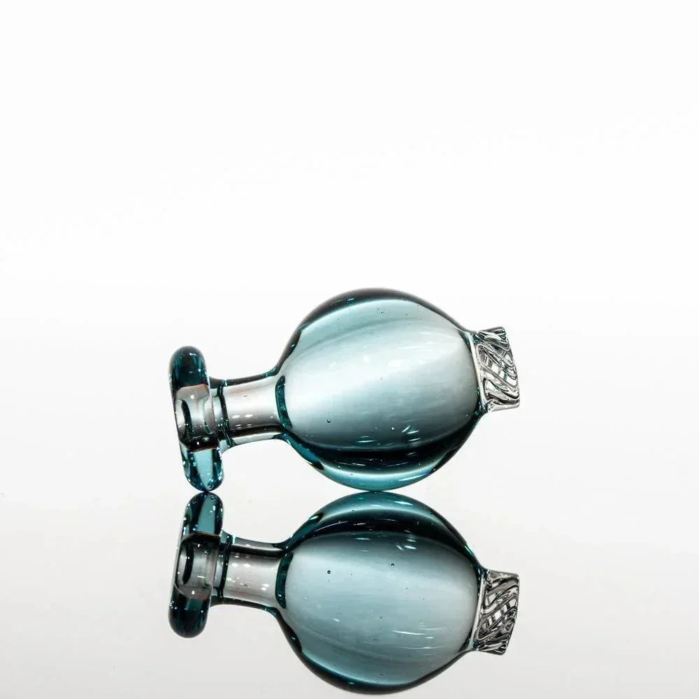 Teal glass pipe with silver accent, reflective surface, heady glass accessory