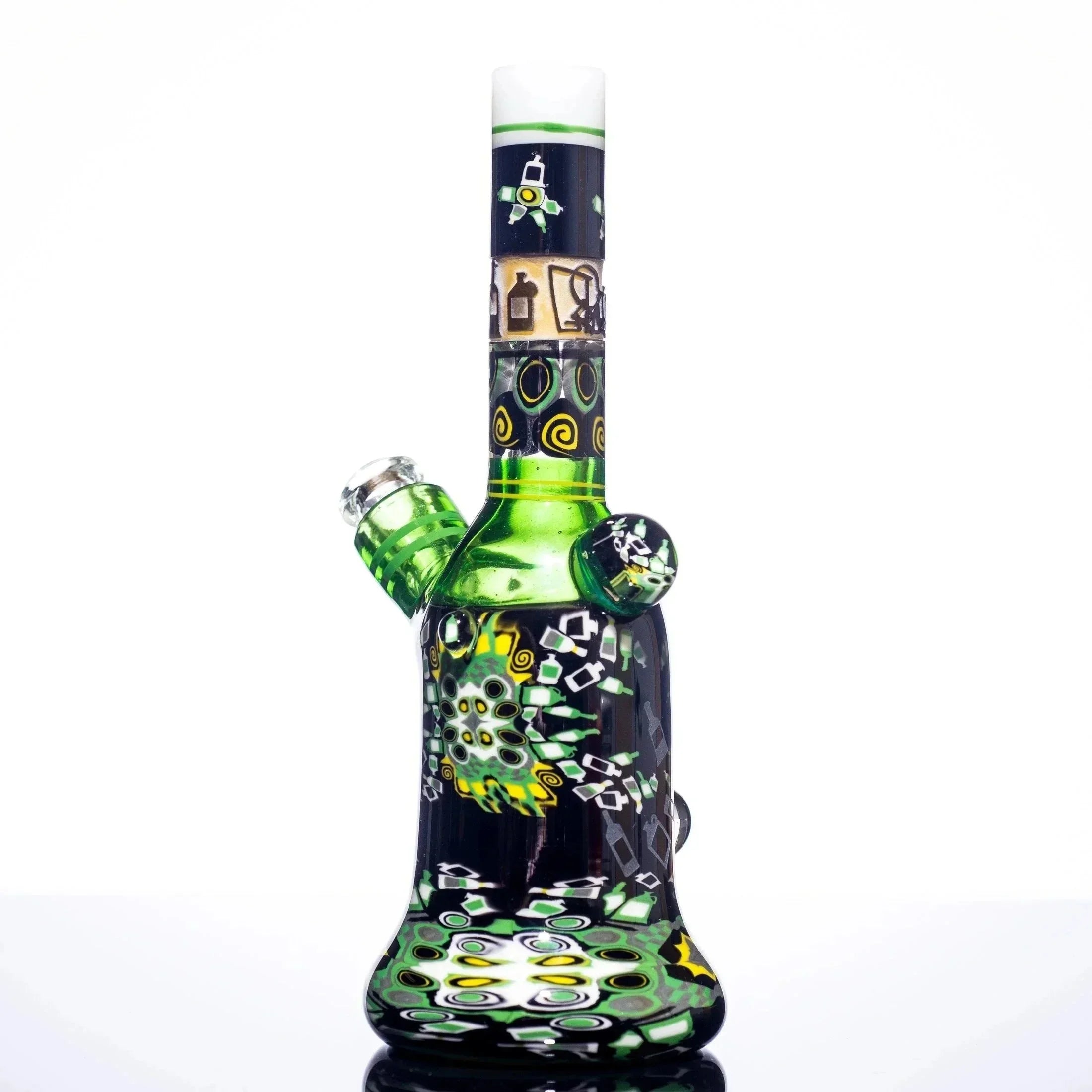 Green and black hand-blown glass bong with intricate alien and bottle designs, heady glass art piece