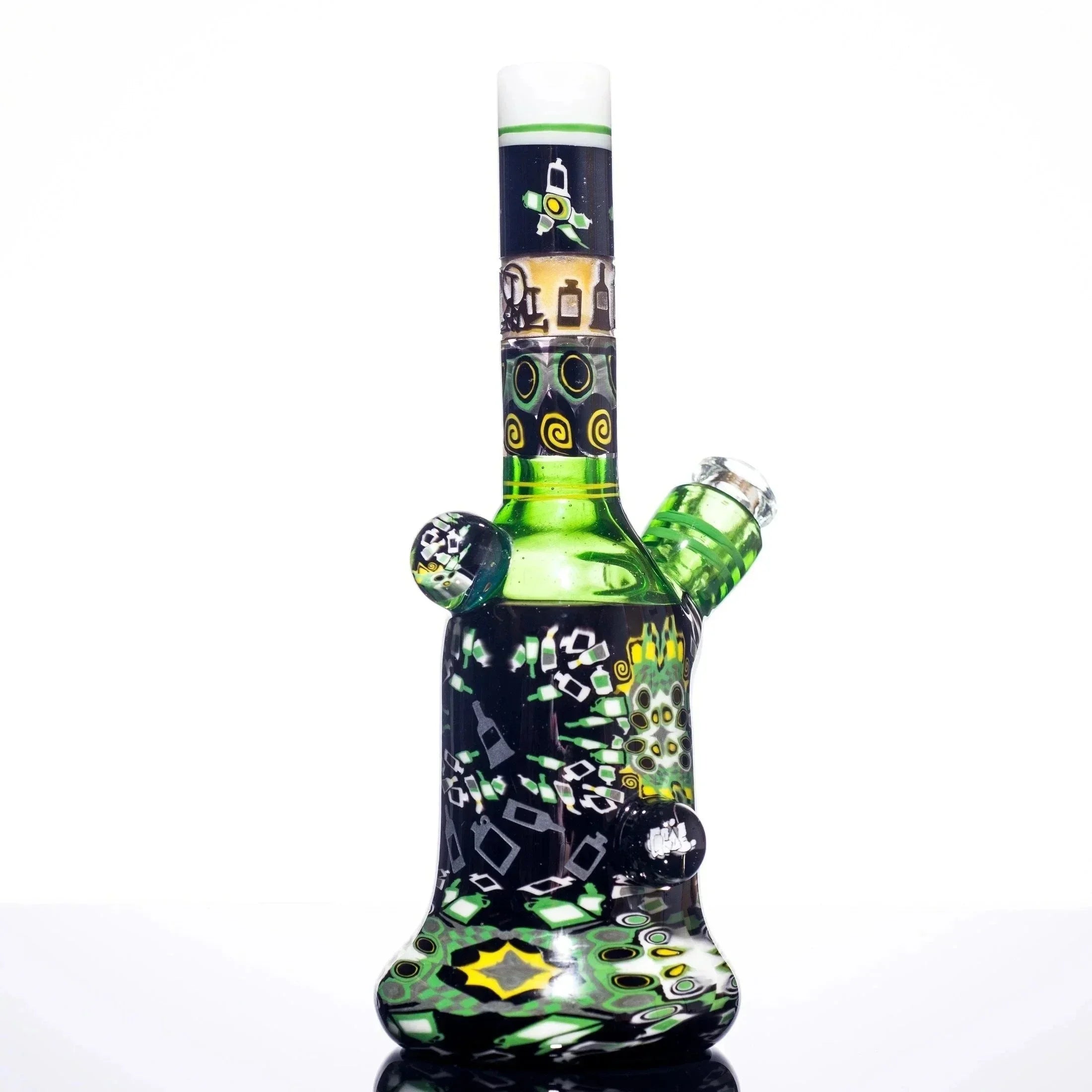 Green and black patterned glass bong with intricate designs and colorful accents