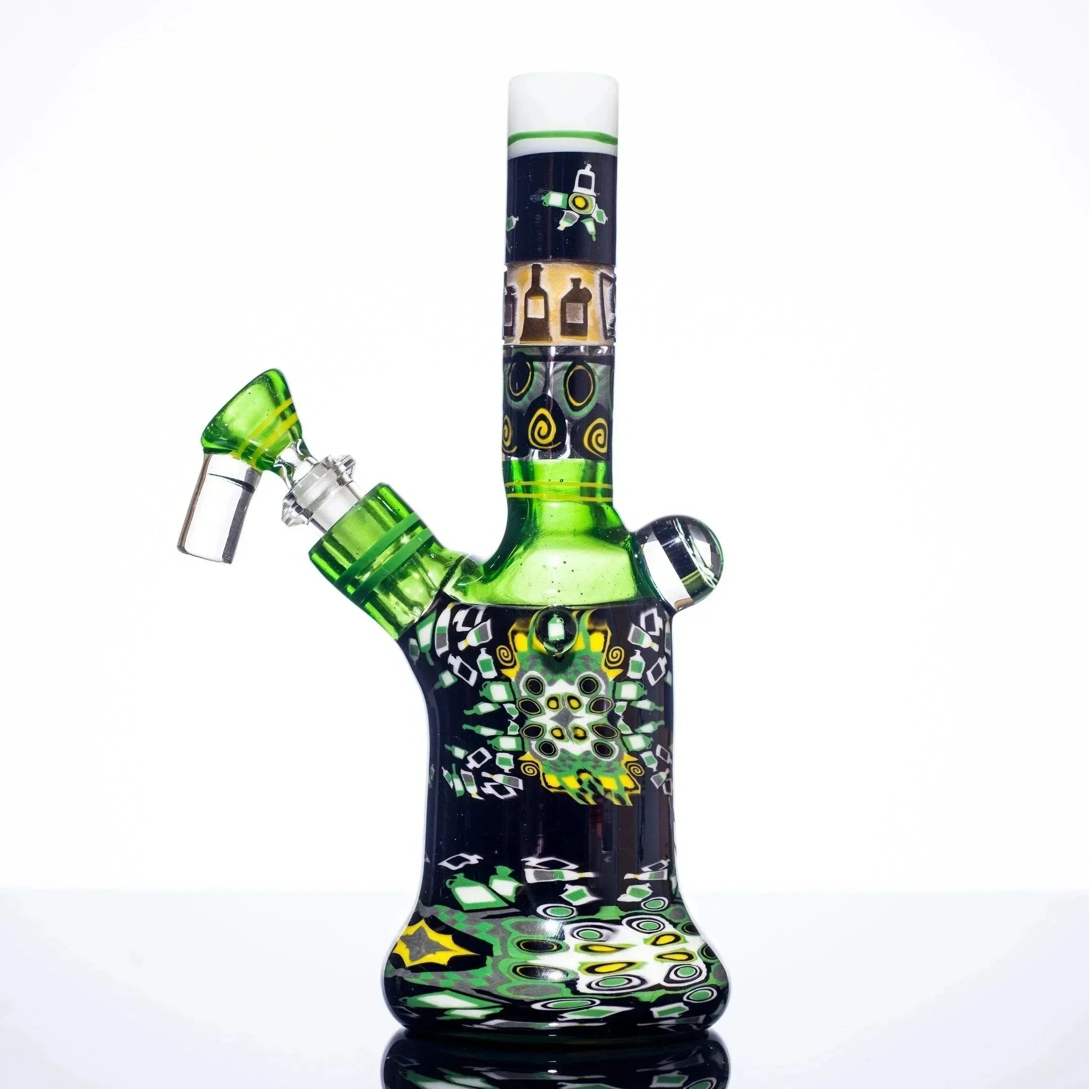 Green and black artistic glass bong with intricate patterns and vibrant designs