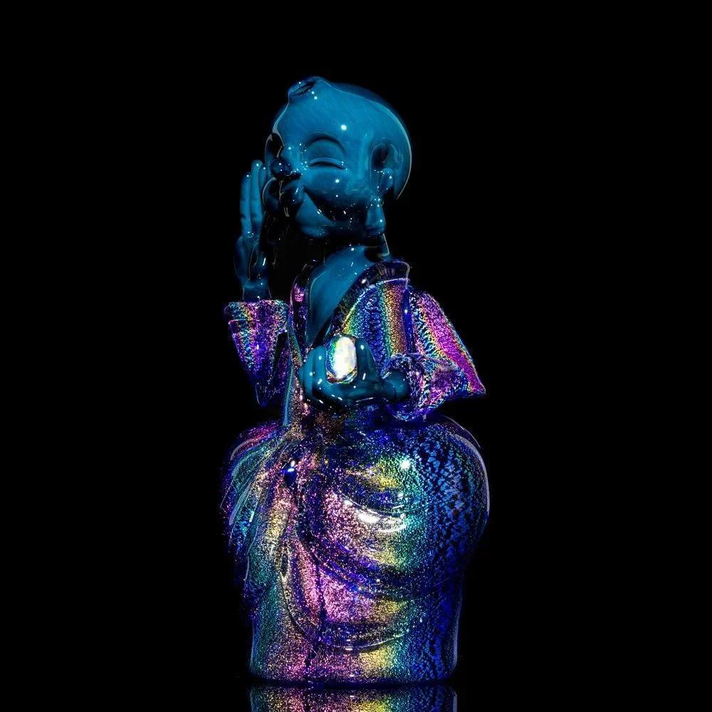 Iridescent glass Buddha figure with rainbow colors on a black background