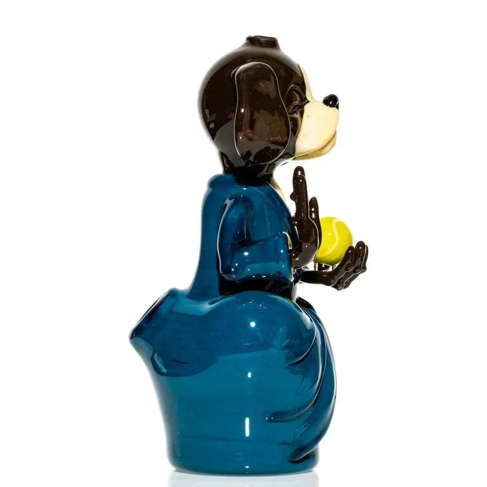 Hand-blown glass dog sculpture meditating in blue robe, holding yellow ball, art glass piece