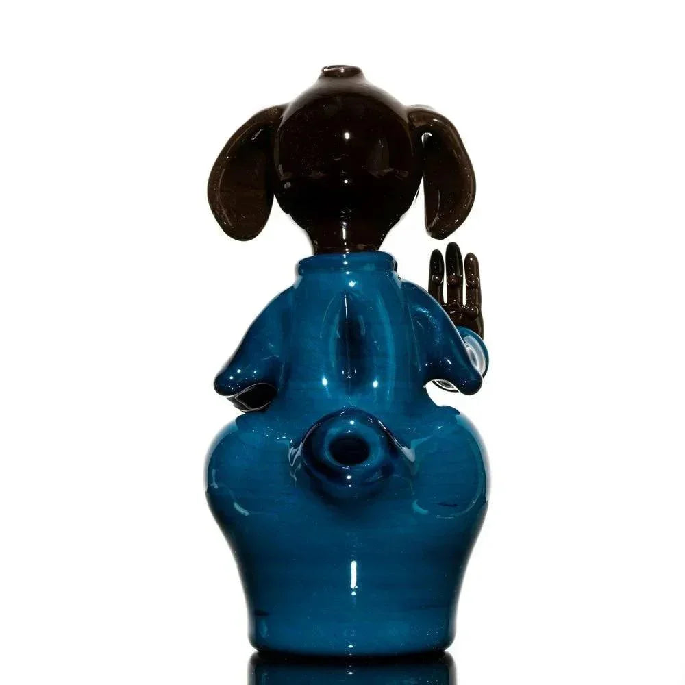 Heady glass meditating dog pipe in blue and black, featuring raised paw and detailed design