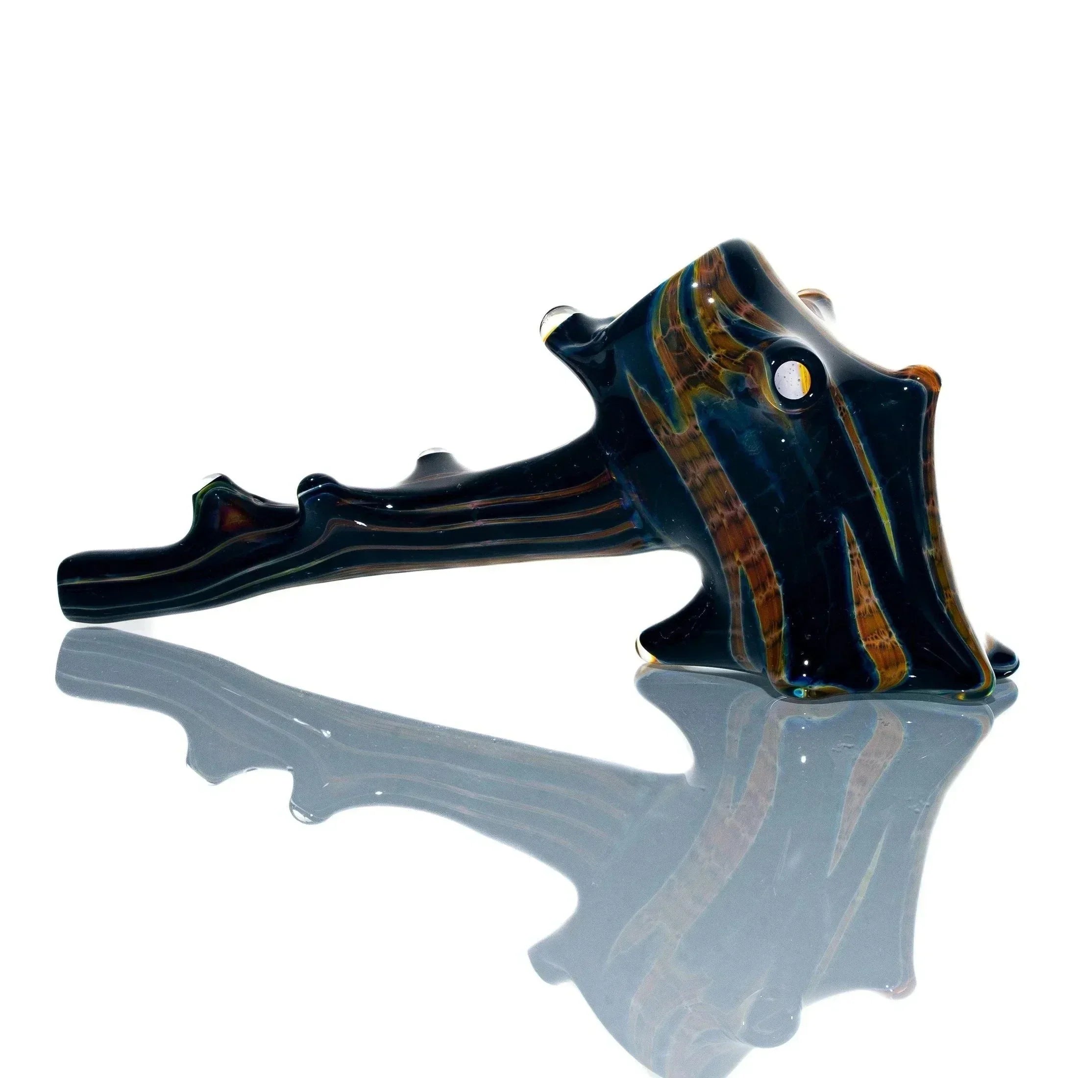 Handcrafted glass pipe with a burnt wood design, resembling a hickory tree branch.