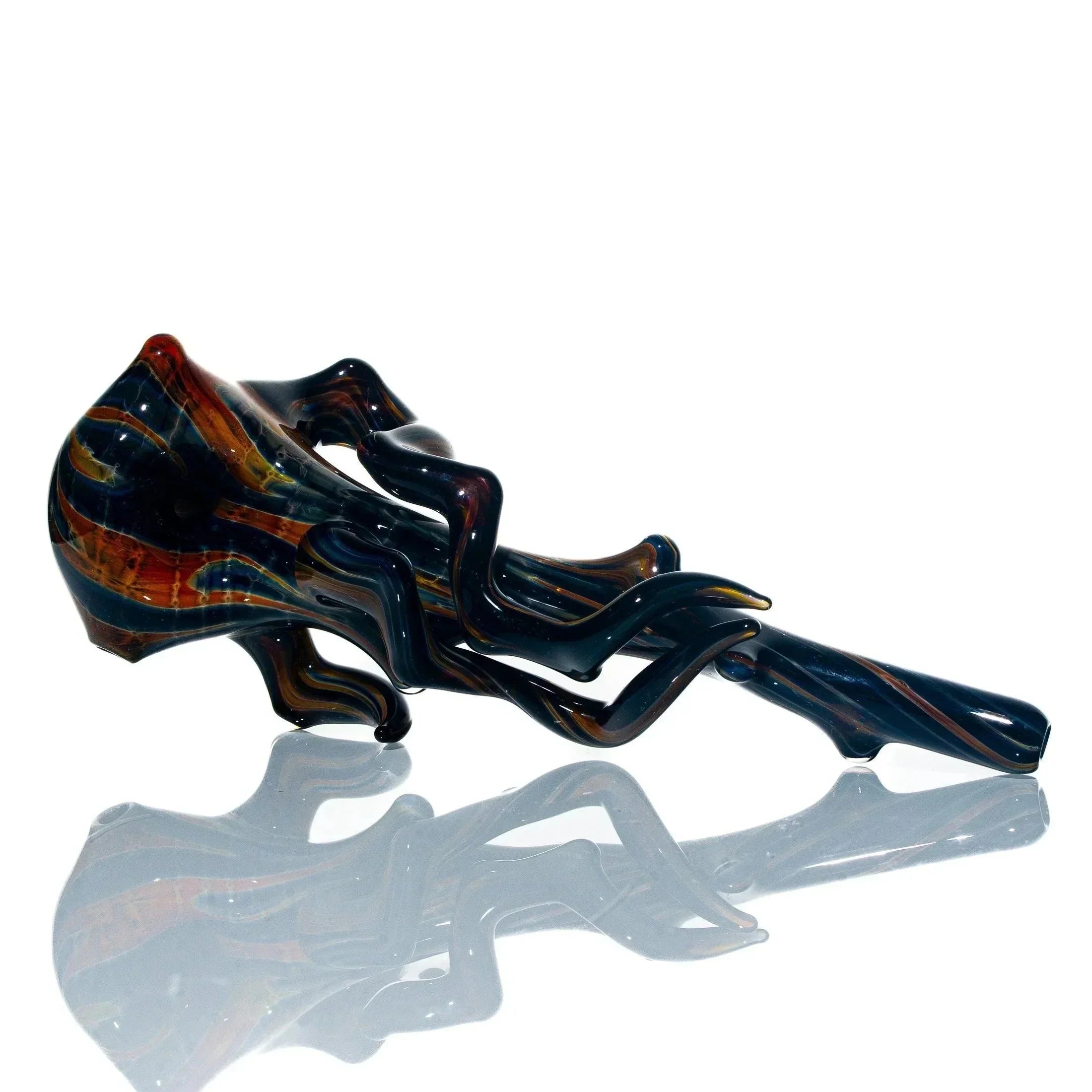 Artistic glass spoon pipe with twisted branch design and multicolored accents on white background