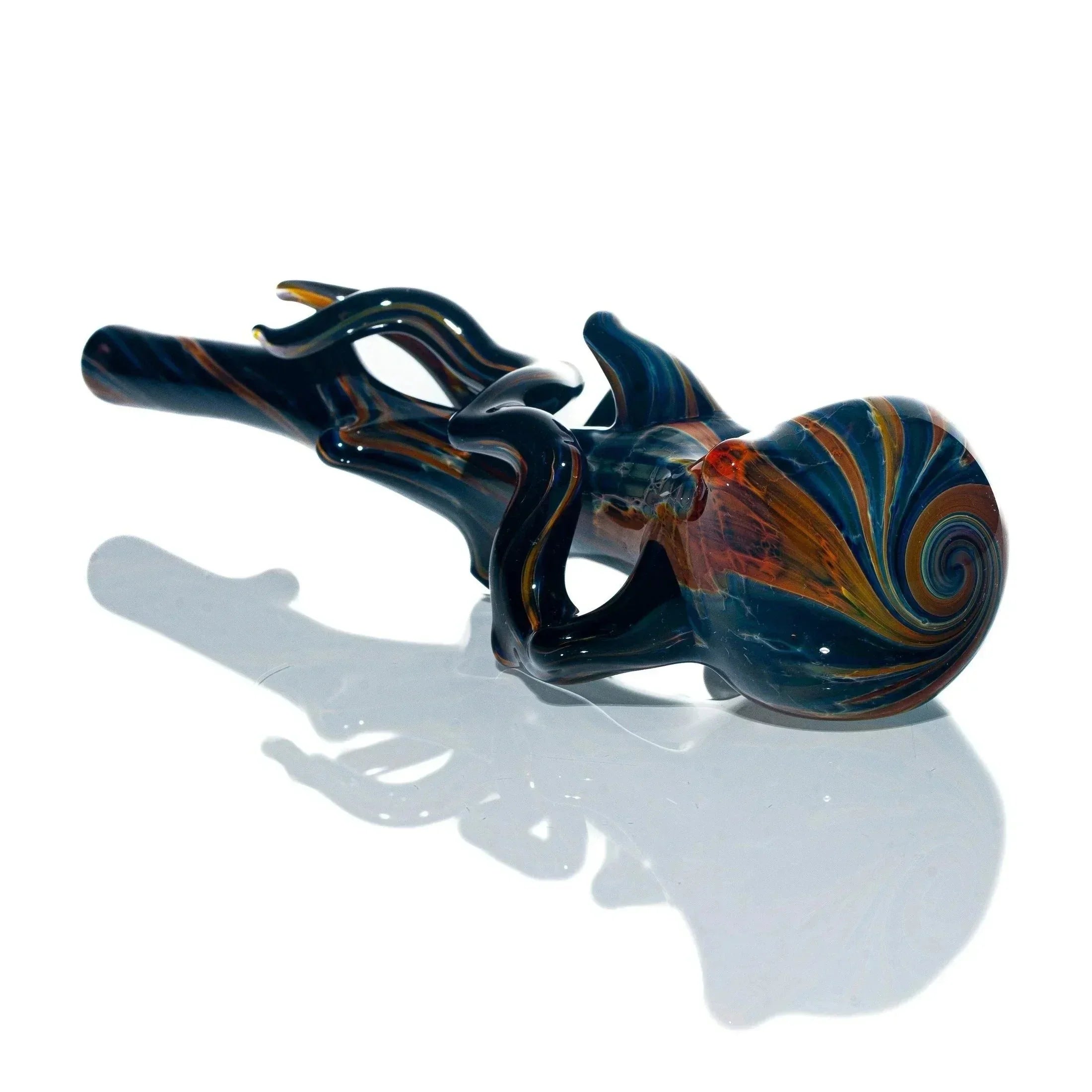 Colorful hand-blown glass pipe with branch-like accents and swirling patterns