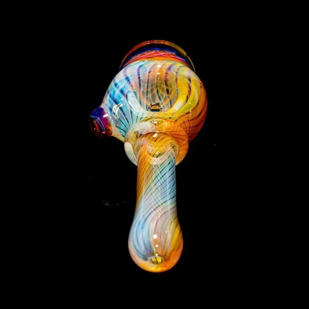 Colorful honeycomb linework glass spoon pipe with vibrant swirls on a black background