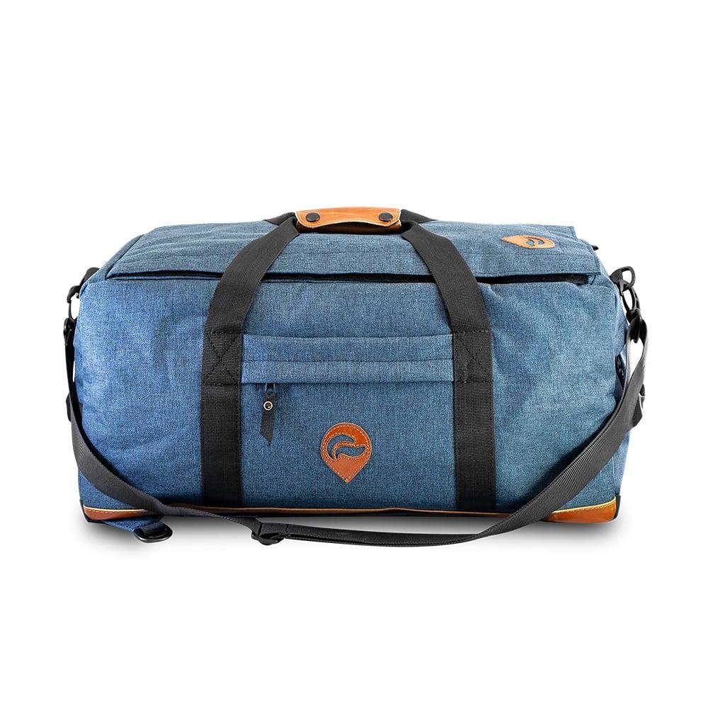 Blue denim duffle bag with black straps and leather accents, front view