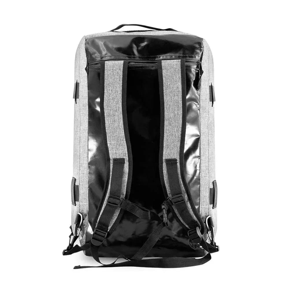 Gray hybrid duffle bag shown vertically with black backpack straps and side clips