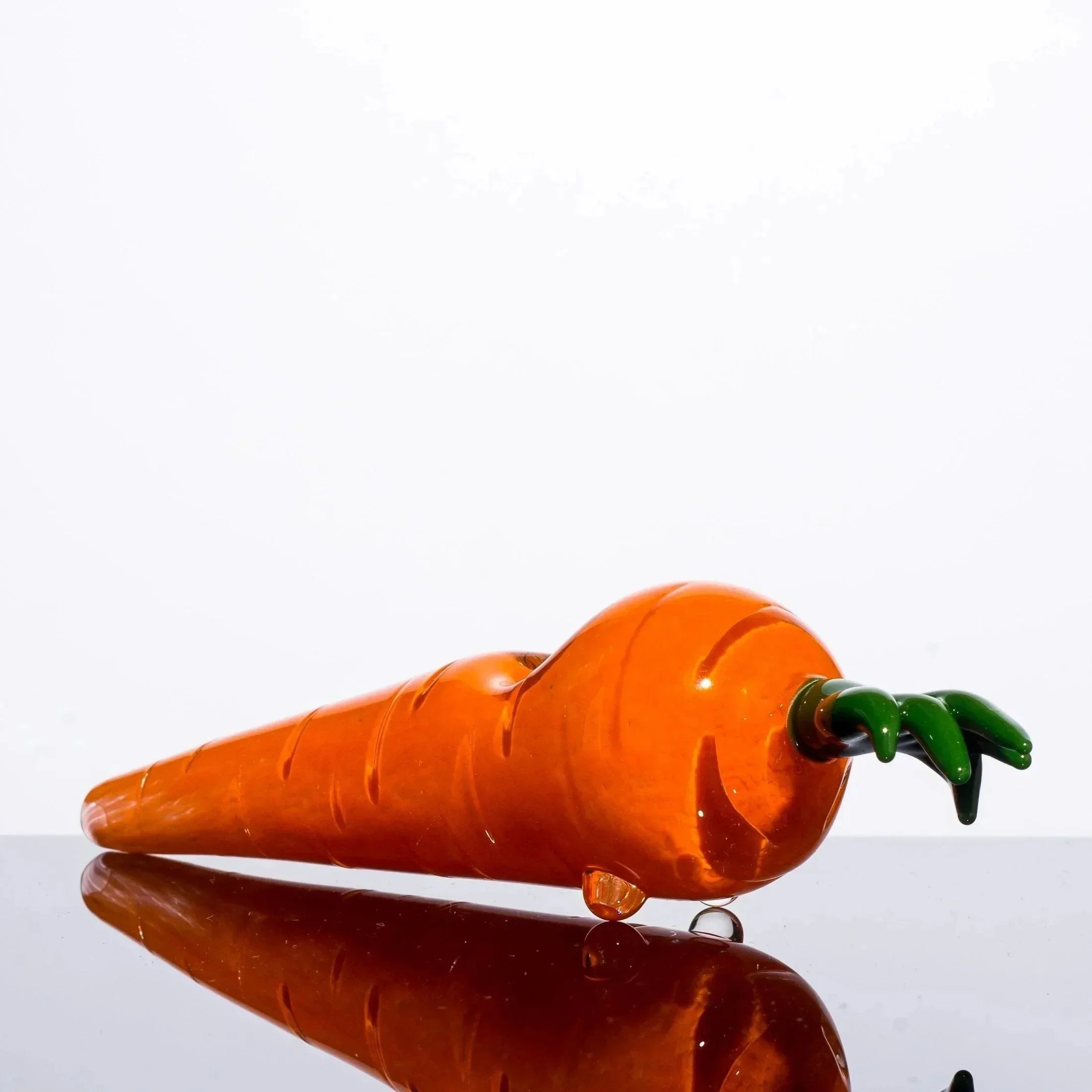 Hand-blown glass carrot pipe with green stem, heady glass art for collectors