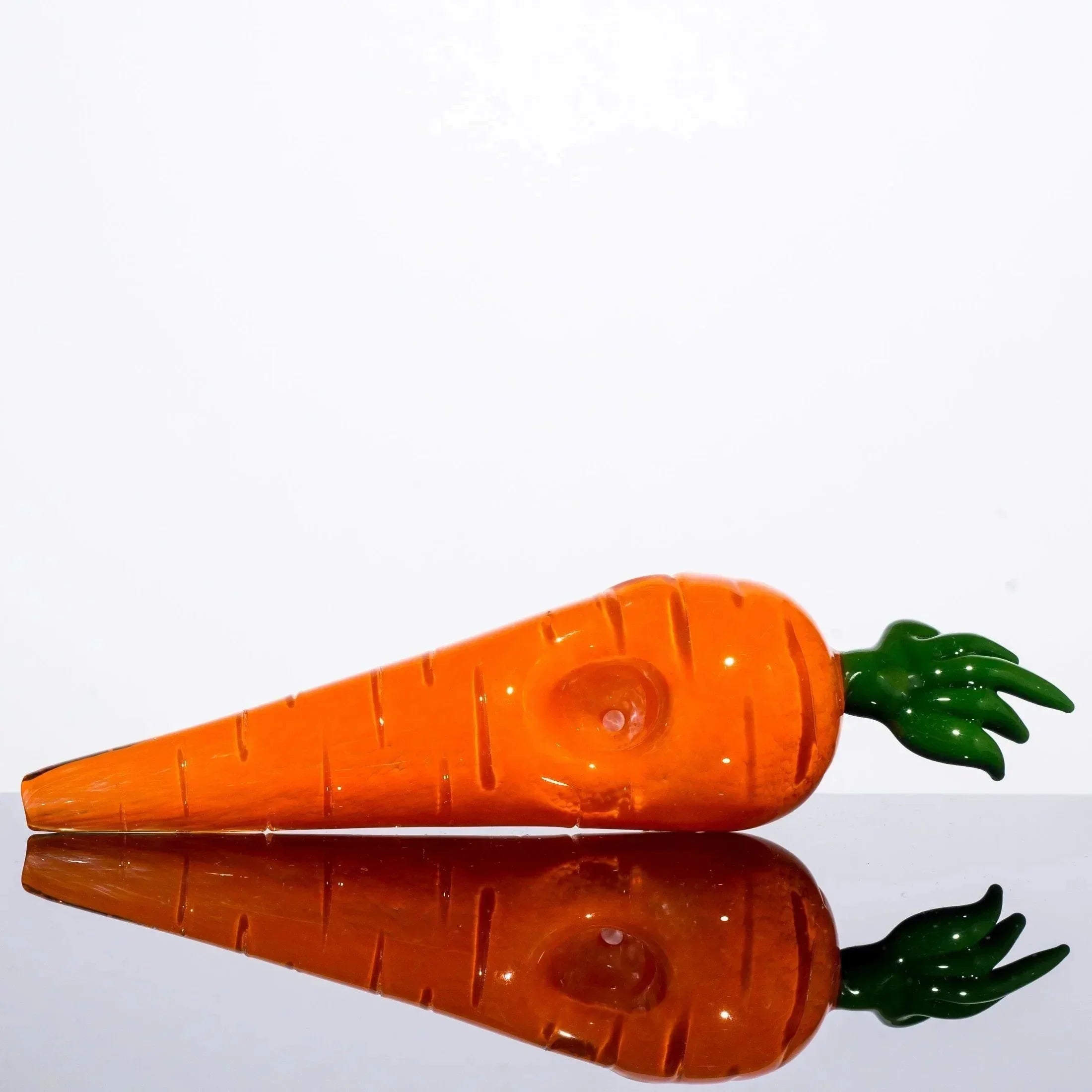 Glass carrot-shaped pipe with green top, heady glass art for smoking accessories